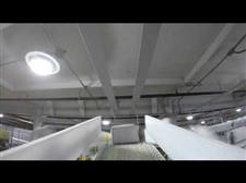 Elevator Conveyor Maximizes Floor Space (from baggers to robotic pick!)