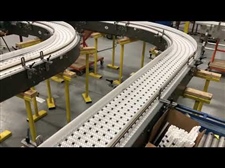 Curve Control using Side Flex Insert Roller Belting Assist