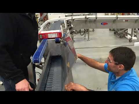 Upender Conveyor Solves Carton Orientation prior to Case Packer