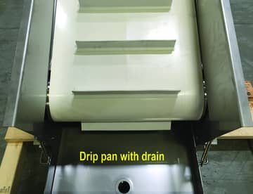 conveyor with cleats and drip pan