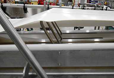 belt lift on food processing conveyor