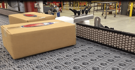cardboard packages on conveyor belt
